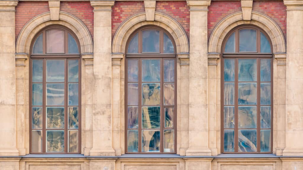 Wondering why window restoration is best for historic buildings? We have answers.